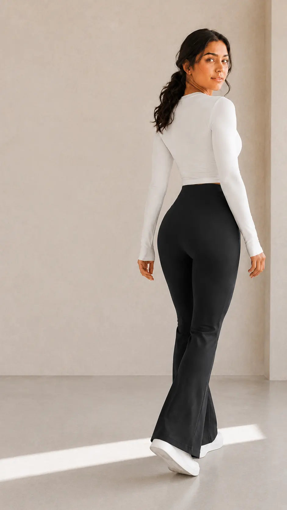 Woman wearing XFyt Flare Yoga Pants