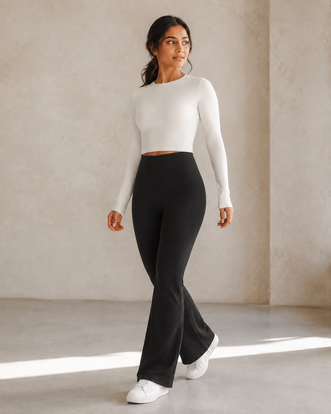 Woman wearing XFyt Chic Black Flare Yoga Pants